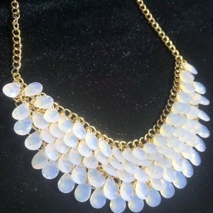 Gold necklace with mermaid cut droplet stones